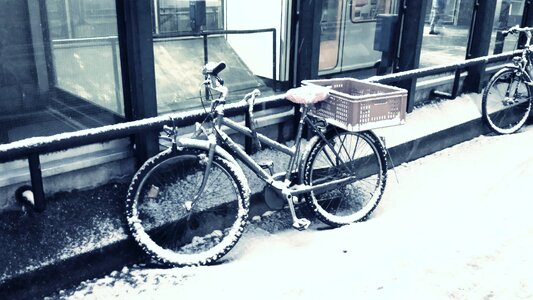 Snowed in mountain bike wheel photo