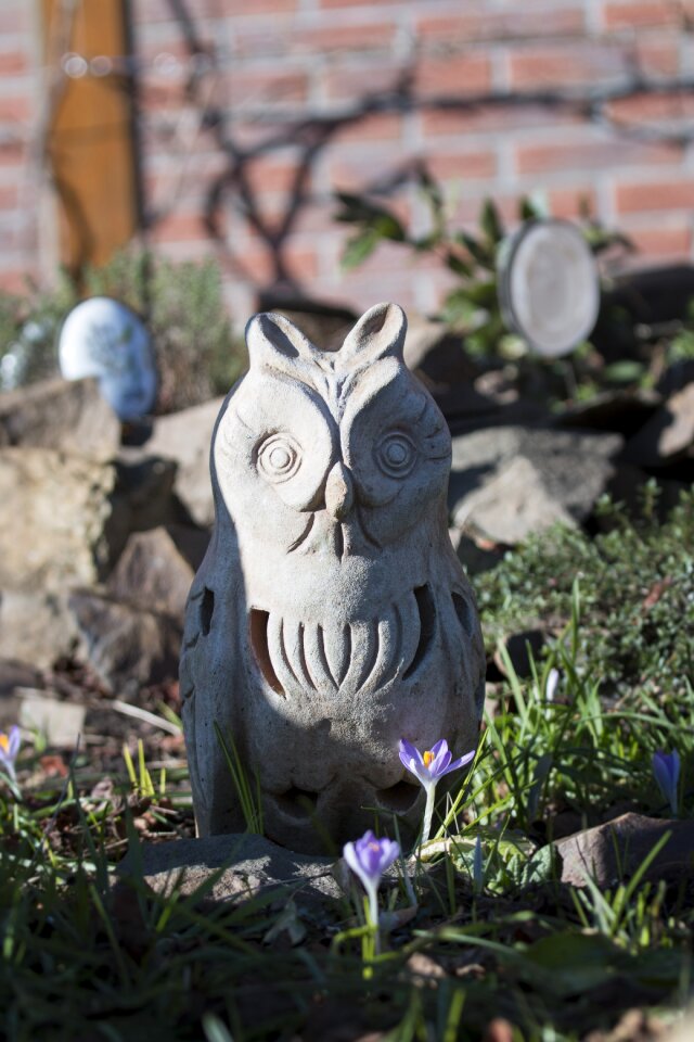 Sculpture owl sun