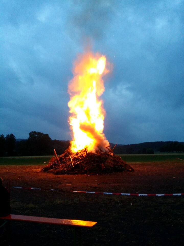 Midsummer wood pile wood fire photo