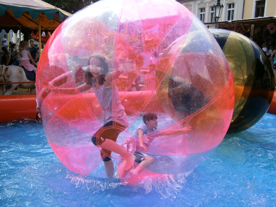 Pleasure zorbing the balls on the water