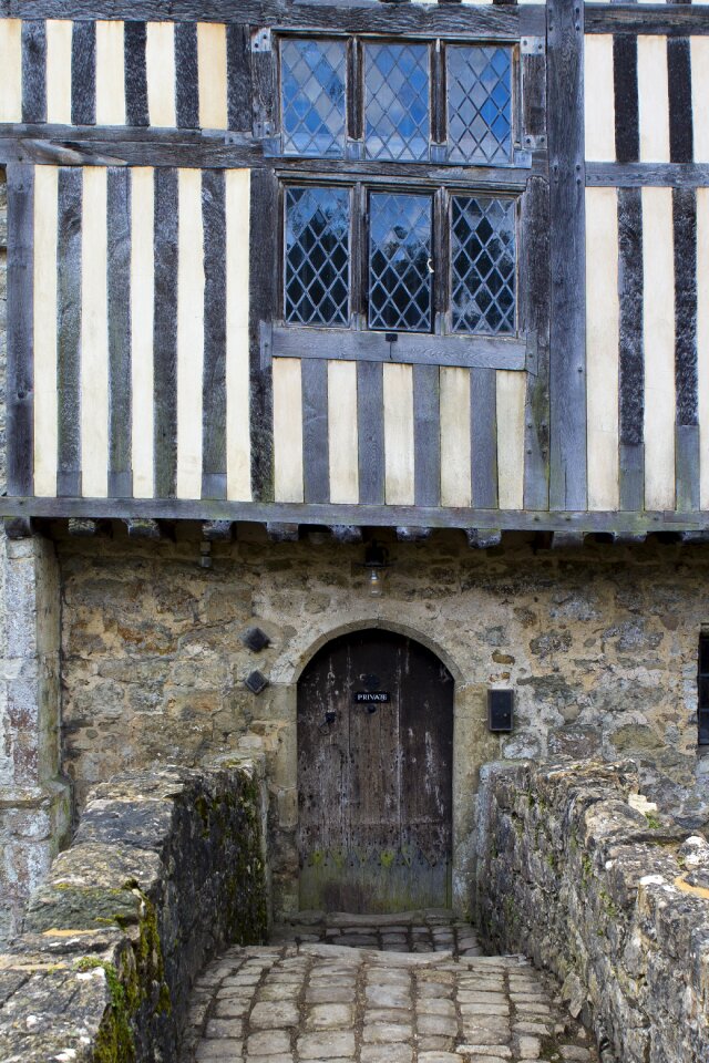 Repaired door stone wall timber frame photo