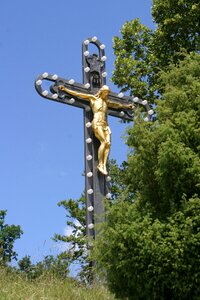 Gold cross kreuzberg monument