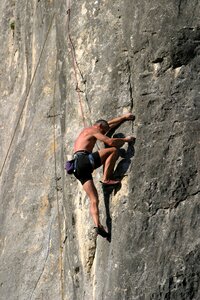 Mountaineer free climber rock wall photo