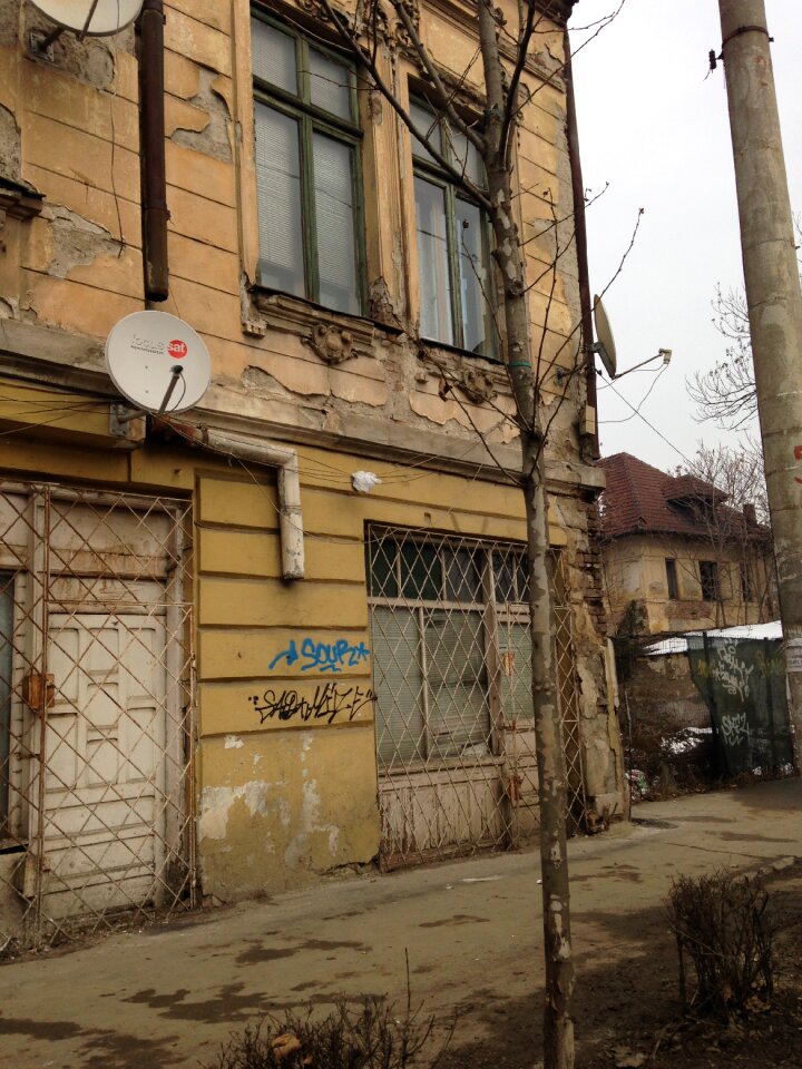 Bucharest building demolished satellite dish