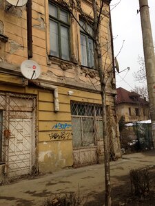 Bucharest building demolished satellite dish