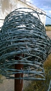 Barbed wire barbed wire fence perimeter fence photo