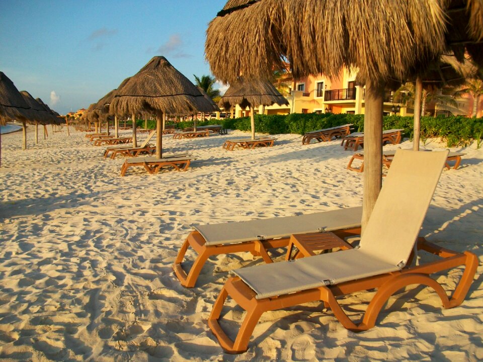 Sand lounge chair palapas