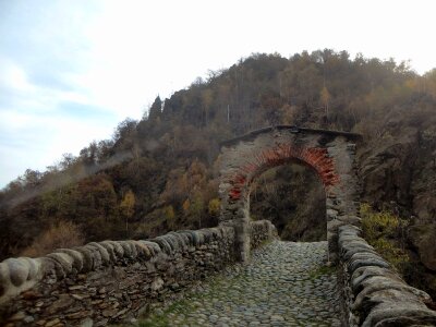 Stone bridge river mountain photo