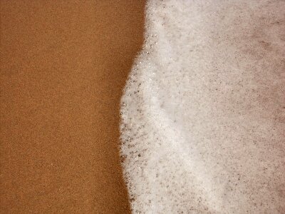 Costa beach sand photo
