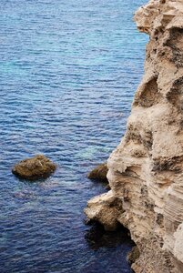 Cliff sea rock
