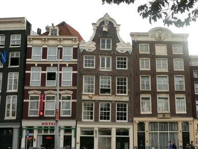 Amsterdam row of houses crooked house photo