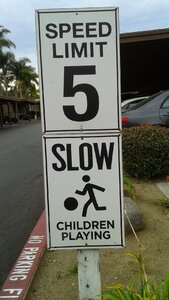 Speed limit slow children playing
