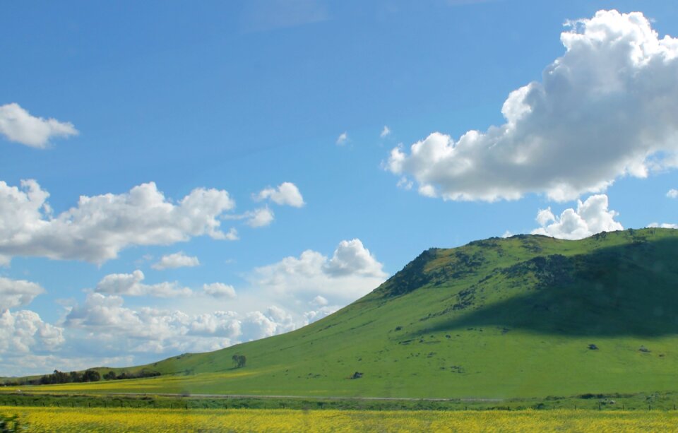 Hill clouds blue