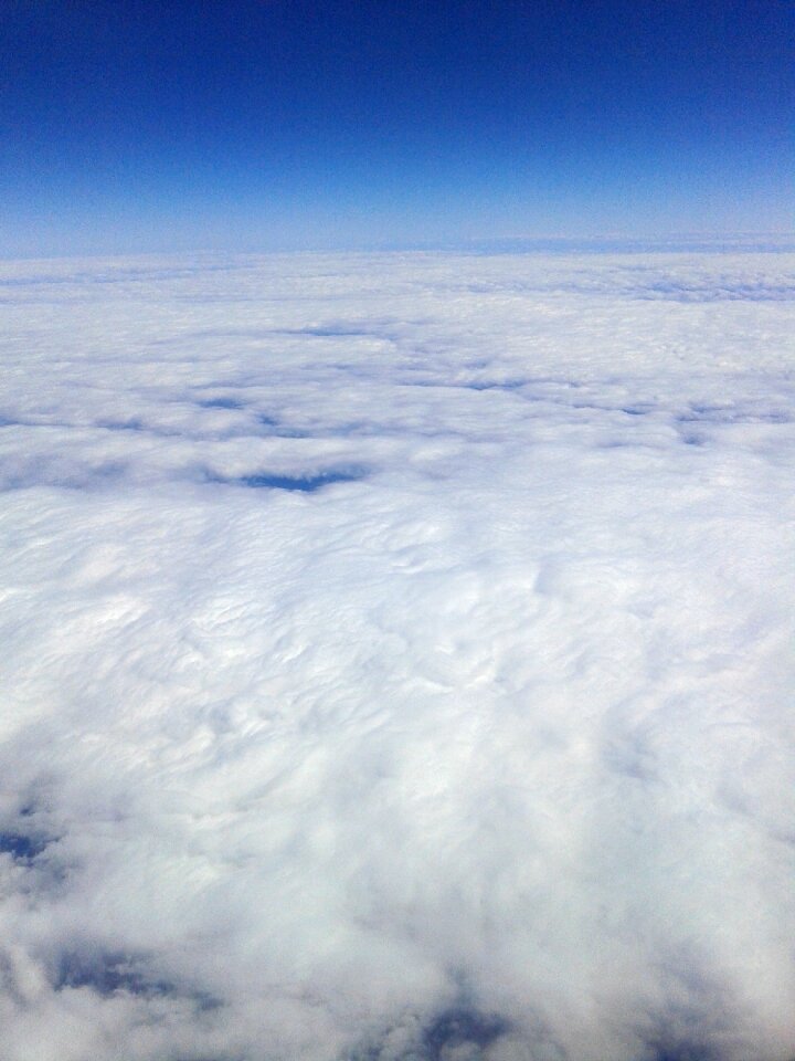 Clouds plane day