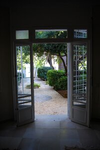 Door open garden against day
