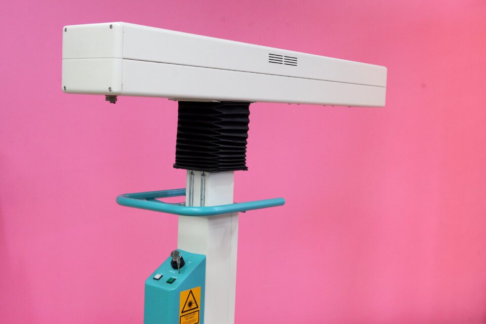 Equipment laser pink background