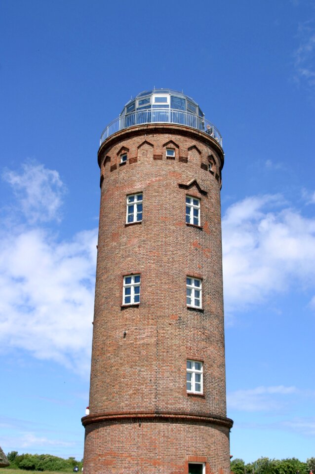 Lighthouse blue sky clouds
