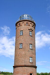Lighthouse blue sky clouds