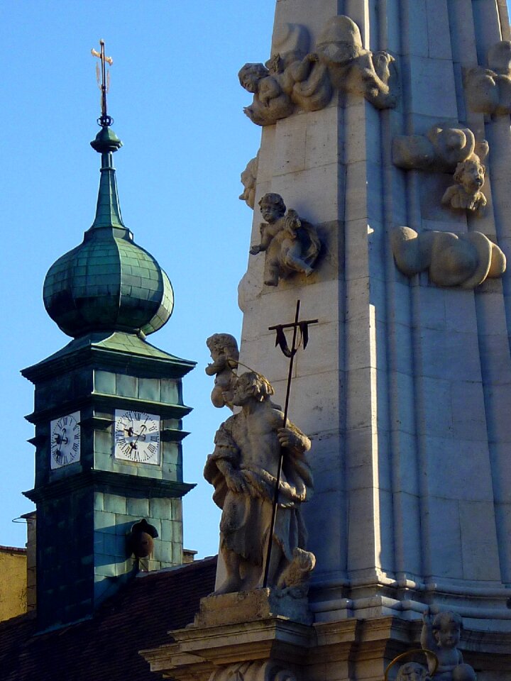 Holy trinity statue blue sky