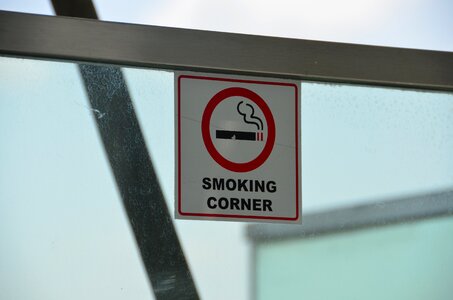 Smokers corner smoking cigarette photo