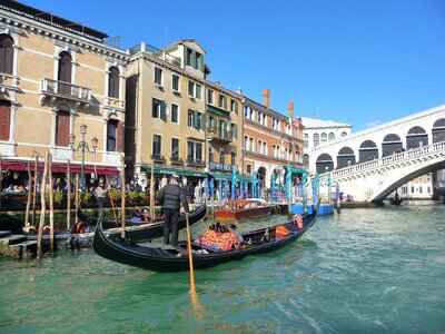 Gondoliers italy bridge photo