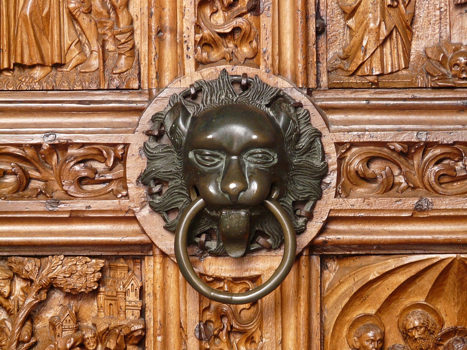 Brass mythical creatures church door
