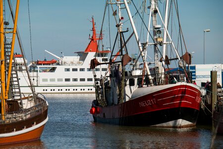 Ferry fishing boats mast photo