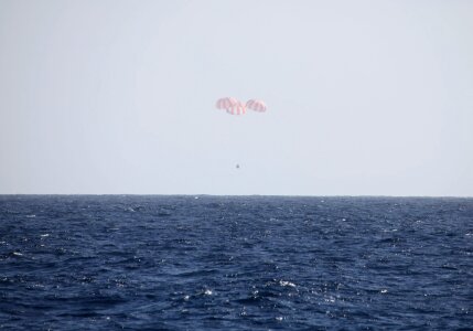 Parachutes ocean sea photo