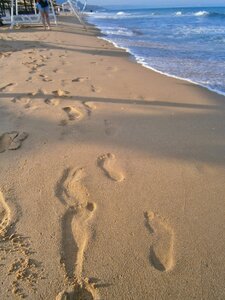 Beach footprint in the sand sunny beach