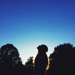 Silhouette long hair blue photo