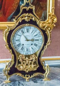 Golden table clock time of photo