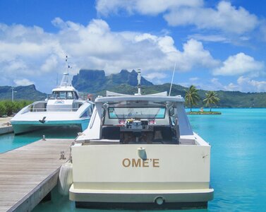 Turquoise boat french polynesia photo