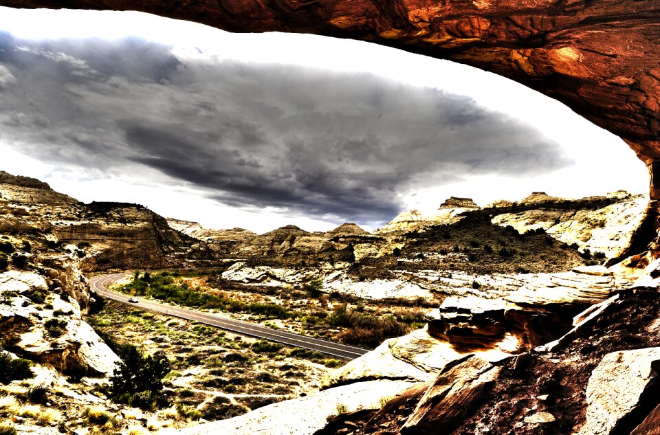 Stone arch rock clouds