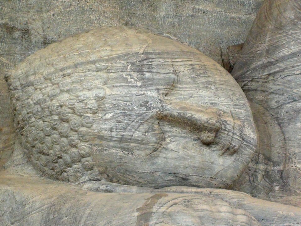 Stone figure lying budha