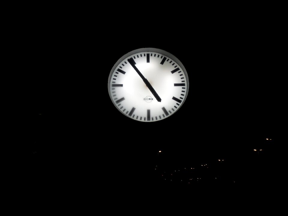 Night railway station station clock