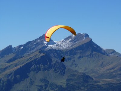 Paragliding sliding gliding mountains photo