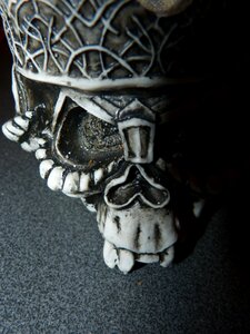 Skull and crossbones gothic sculpture photo