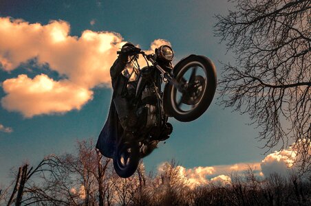 Biker motorcyclist flying