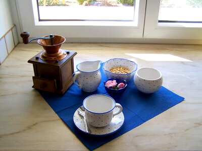 Blue-and-white porcelain objects antique coffee grinder still life photo