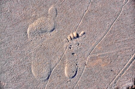 Foot step sand sea