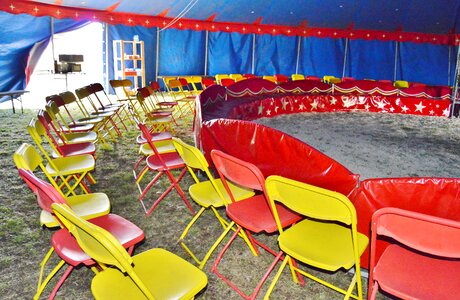 Circus interior rows of chairs