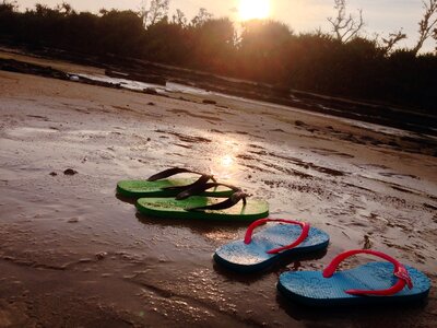 Beach slippers sunset photo