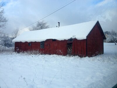 Red house snow twilight