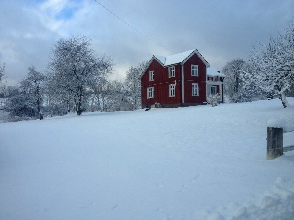 Red house snow twilight