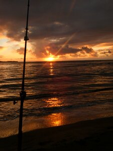 Beach fishing pole photo