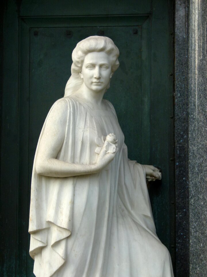 Cemetery woman sculpture condolences