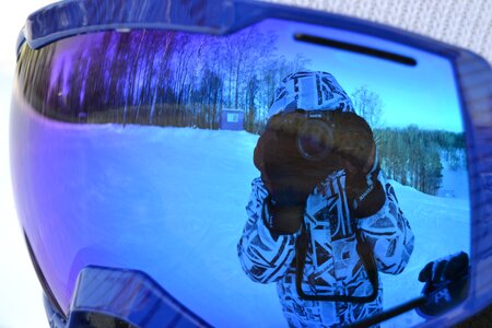 Winter snowboarder reflection