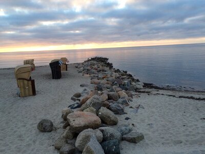 Sunset stones sea photo