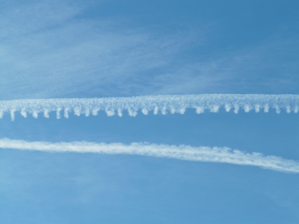 Blue flying aircraft
