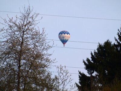 Power line hot air balloon ride flying